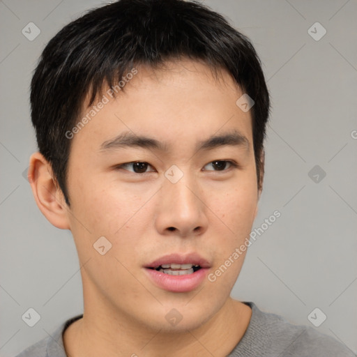 Neutral asian young-adult male with short  brown hair and brown eyes