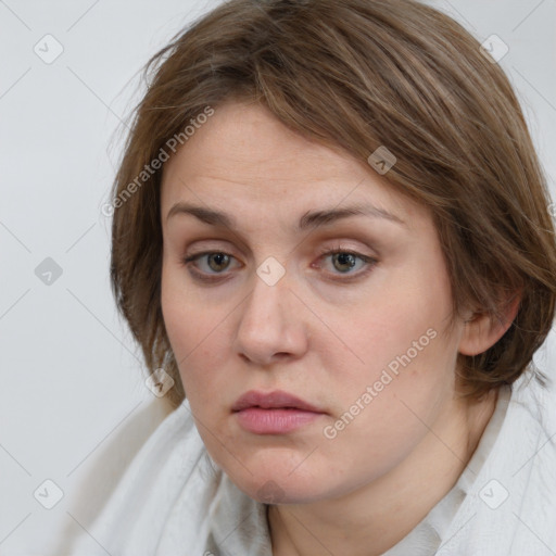 Neutral white young-adult female with medium  brown hair and grey eyes