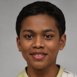 Joyful latino young-adult female with short  black hair and brown eyes