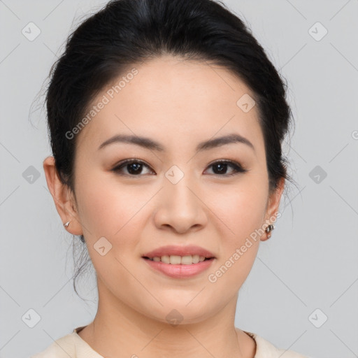 Joyful asian young-adult female with medium  brown hair and brown eyes