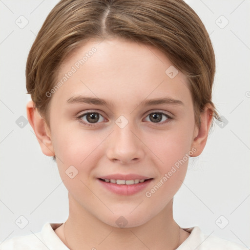 Joyful white child female with short  brown hair and brown eyes