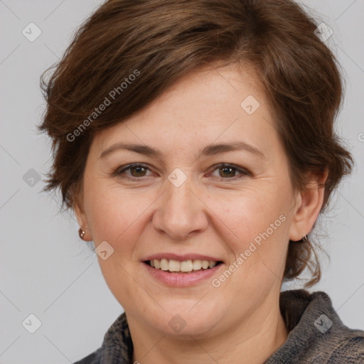 Joyful white adult female with medium  brown hair and grey eyes