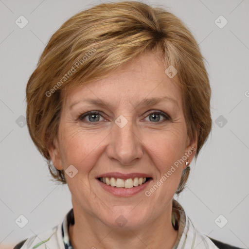 Joyful white adult female with medium  brown hair and grey eyes