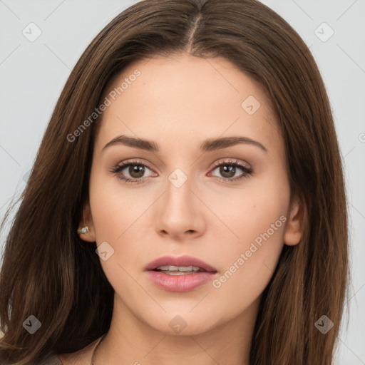 Neutral white young-adult female with long  brown hair and brown eyes