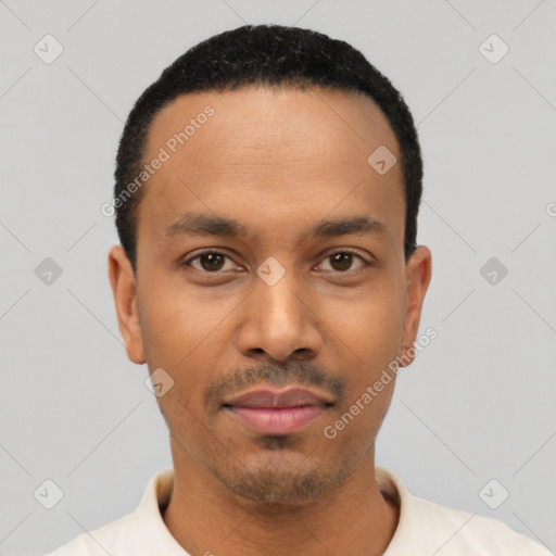 Neutral latino young-adult male with short  black hair and brown eyes