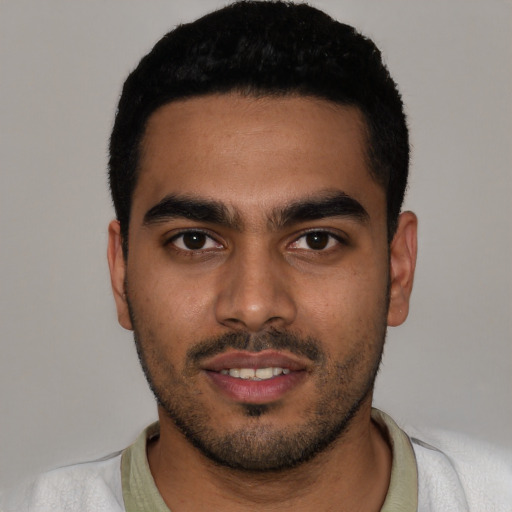Neutral latino young-adult male with short  black hair and brown eyes