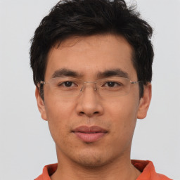 Neutral asian young-adult male with short  brown hair and brown eyes