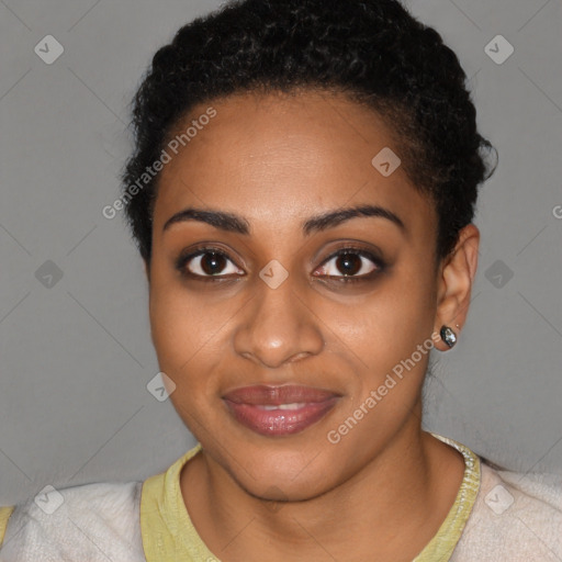 Joyful black young-adult female with short  brown hair and brown eyes