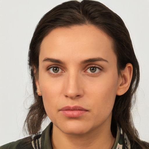 Neutral white young-adult female with medium  brown hair and brown eyes