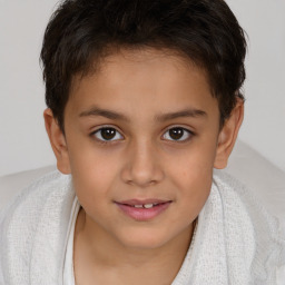 Joyful white child female with short  brown hair and brown eyes