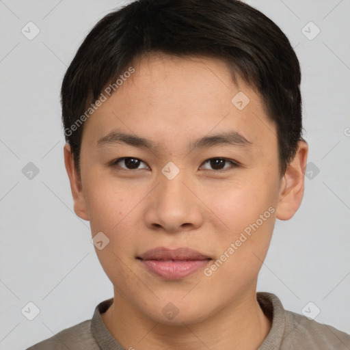 Joyful asian young-adult male with short  brown hair and brown eyes