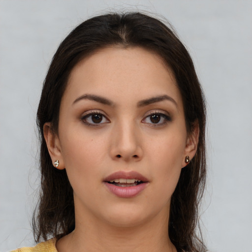 Neutral asian young-adult female with long  brown hair and brown eyes
