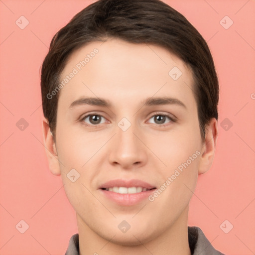 Joyful white young-adult female with short  brown hair and brown eyes