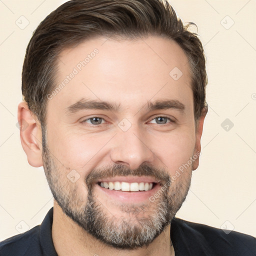 Joyful white young-adult male with short  brown hair and brown eyes