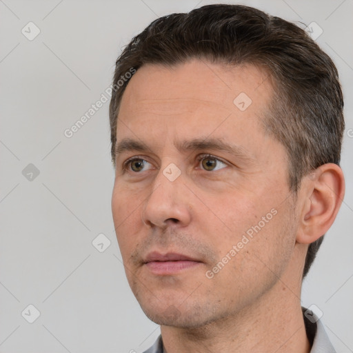 Neutral white adult male with short  brown hair and brown eyes