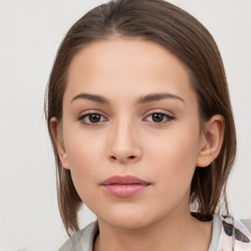 Neutral white young-adult female with medium  brown hair and brown eyes