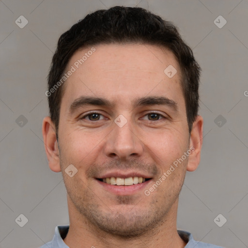 Joyful white young-adult male with short  brown hair and brown eyes