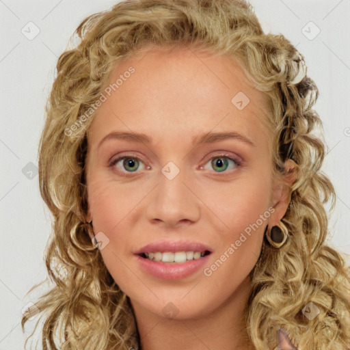 Joyful white young-adult female with long  brown hair and blue eyes