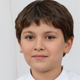 Joyful white child female with short  brown hair and brown eyes