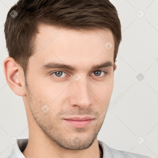 Neutral white young-adult male with short  brown hair and brown eyes