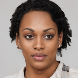 Neutral black young-adult female with short  black hair and brown eyes