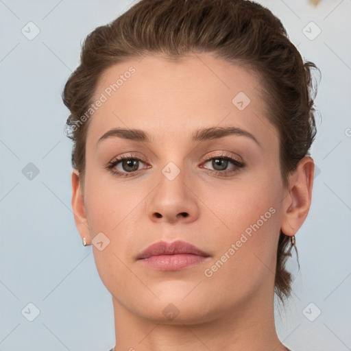 Neutral white young-adult female with short  brown hair and brown eyes