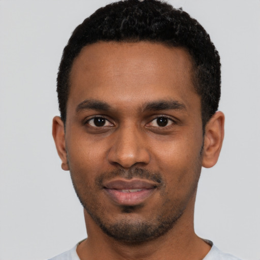 Neutral black young-adult male with short  black hair and brown eyes