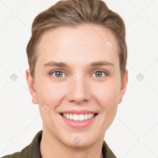 Joyful white young-adult female with short  brown hair and grey eyes