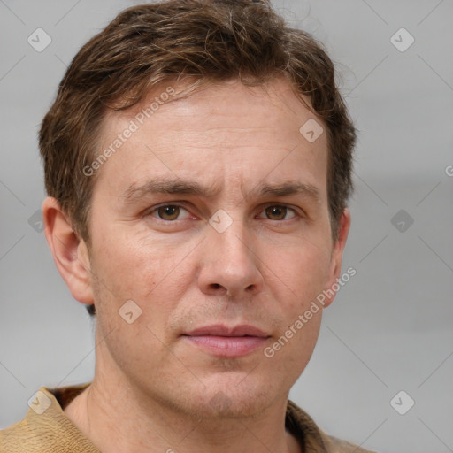 Neutral white adult male with short  brown hair and grey eyes