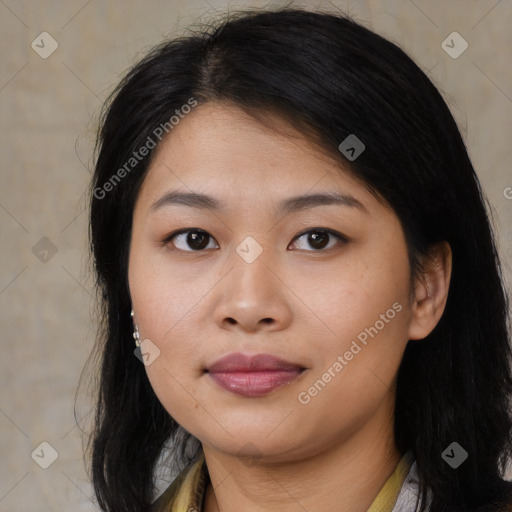 Joyful asian young-adult female with long  brown hair and brown eyes