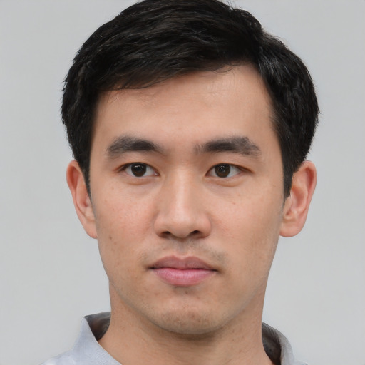 Neutral white young-adult male with short  black hair and brown eyes