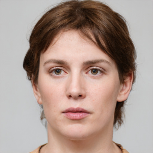 Neutral white young-adult female with medium  brown hair and green eyes