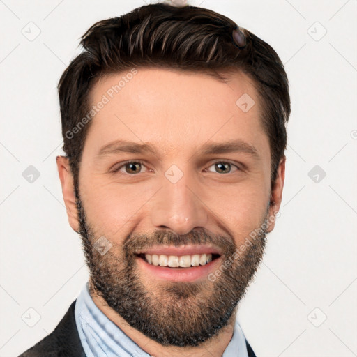 Joyful white young-adult male with short  black hair and brown eyes