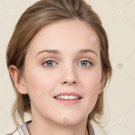 Joyful white young-adult female with medium  brown hair and blue eyes