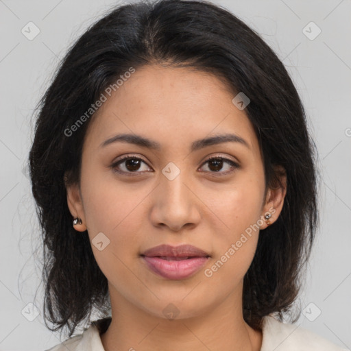 Joyful latino young-adult female with medium  brown hair and brown eyes