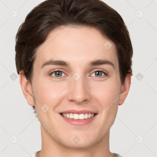 Joyful white young-adult female with short  brown hair and grey eyes