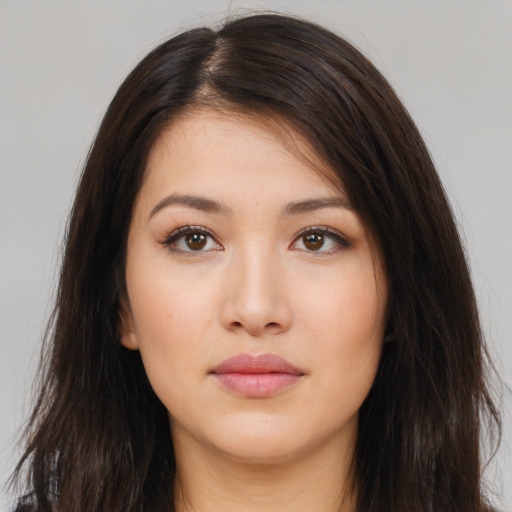 Neutral white young-adult female with long  brown hair and brown eyes