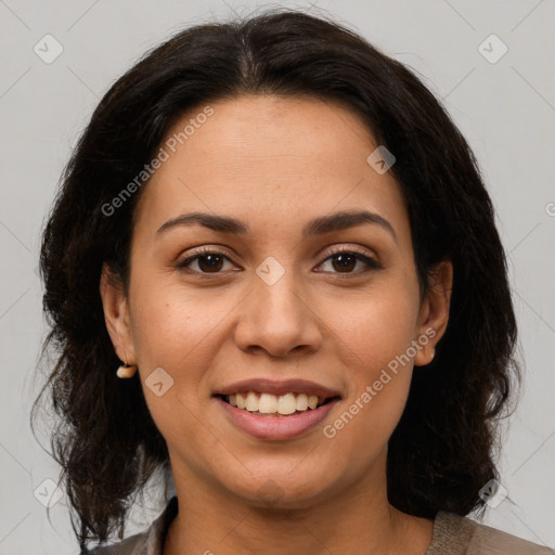 Joyful latino young-adult female with medium  brown hair and brown eyes