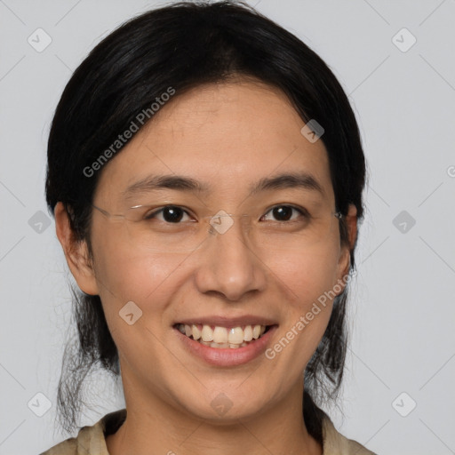 Joyful white young-adult female with medium  black hair and brown eyes