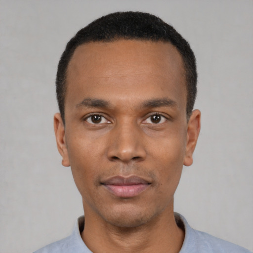 Neutral black young-adult male with short  black hair and brown eyes
