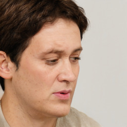 Neutral white adult male with short  brown hair and brown eyes