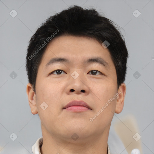 Neutral asian young-adult male with short  brown hair and brown eyes