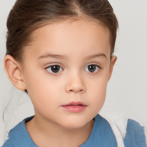 Neutral white child female with short  brown hair and brown eyes