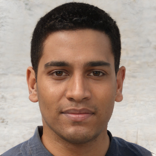 Neutral black young-adult male with short  brown hair and brown eyes