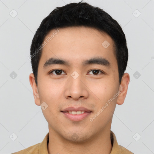 Joyful asian young-adult male with short  black hair and brown eyes