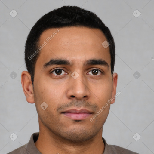 Neutral latino young-adult male with short  black hair and brown eyes