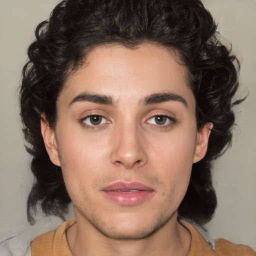 Joyful white young-adult male with medium  brown hair and brown eyes