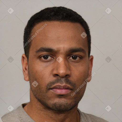 Neutral latino young-adult male with short  black hair and brown eyes