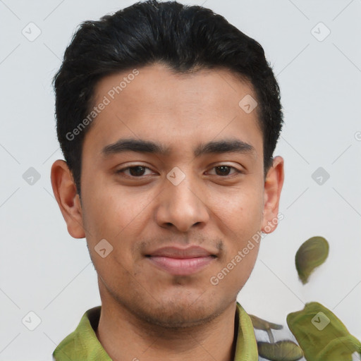 Joyful latino young-adult male with short  brown hair and brown eyes