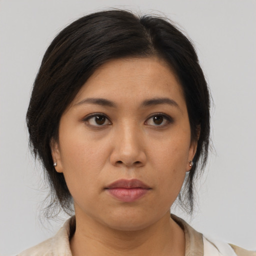 Neutral asian young-adult female with medium  brown hair and brown eyes